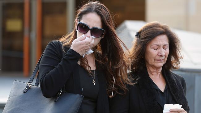 Voula Delios’s daughter Maria, left, and another family member leaving the Supreme Court in Hobart after the verdict and sentencing. Picture: SAM ROSEWARNE.