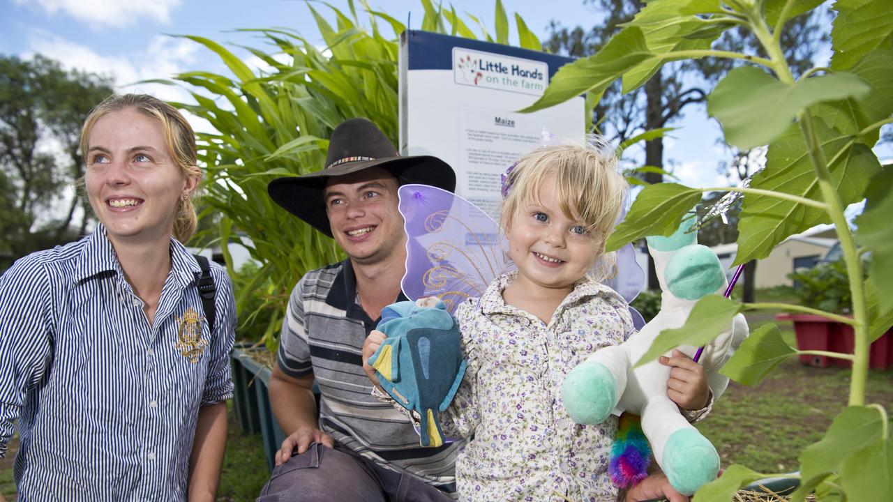 Isabelle Coutts-Smith (front) with Sinclair Ridgway and Corey Coutts-Smith check out Little Hands on the Farm display at 2019 Toowoomba Royal Show.