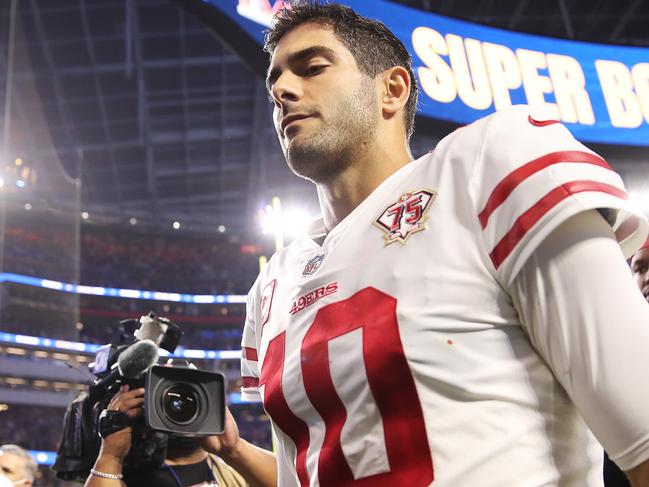 INGLEWOOD, CALIFORNIA - JANUARY 30: Jimmy Garoppolo #10 of the San Francisco 49ers walks off the field after being defeated by the Los Angeles Rams in the NFC Championship Game at SoFi Stadium on January 30, 2022 in Inglewood, California. The Rams defeated the 49ers 20-17.   Christian Petersen/Getty Images/AFP == FOR NEWSPAPERS, INTERNET, TELCOS & TELEVISION USE ONLY ==