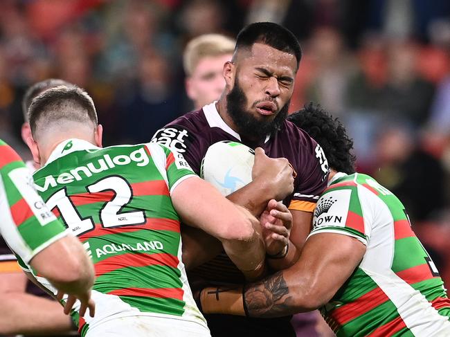 BRISBANE, AUSTRALIA - JUNE 17: Payne Haas of the Broncos is tackled during the round 15 NRL match between the Brisbane Broncos and the South Sydney Rabbitohs at Suncorp Stadium, on June 17, 2021, in Brisbane, Australia. (Photo by Bradley Kanaris/Getty Images)