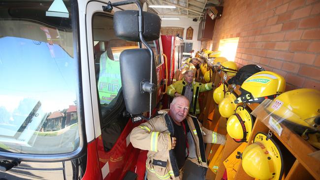 It’s a squeeze: Rochester CFA 1st Lieutenant Brett Kyne and crew are forced to change into their gear next to the truck. Picture Yuri Kouzmin