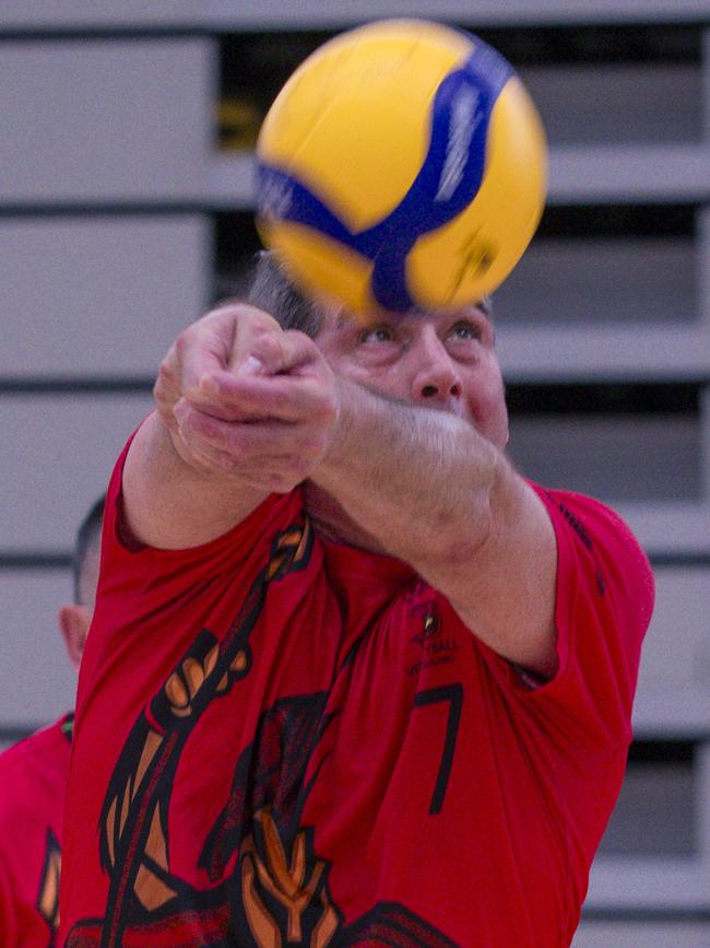 Action as Sparta v the Crippled Wombats in the Pan Pacific Masters Games Volleyball tournament. Picture: Glenn Campbell