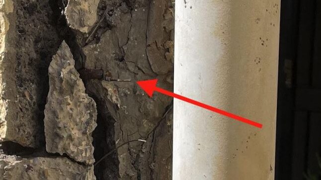 Steel pins holding reinforcement in place with minimal concrete cover