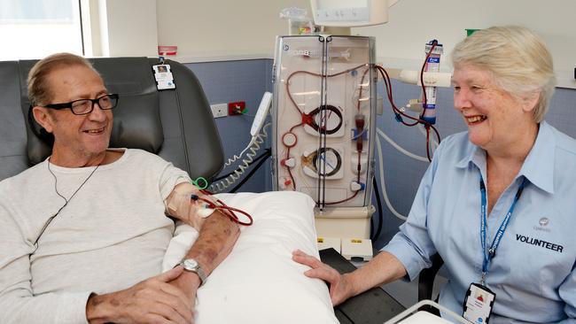 Epworth Eastern volunteer driver Heather Hutton shares a moment with Donvale client Rob Brodie. Heather volunteers to transport Rob and others to and from the renal dialysis unit of the hospital.