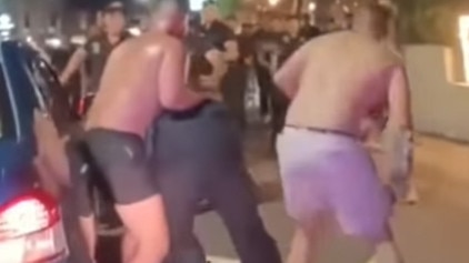 Video footage reportedly shows shirtless Australian tourist and his mates wielding what appear to be planks of wood during a brawl outside Finns Beach Club.