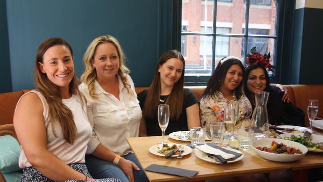 (L-R) Brooke, Jasmine, Acacian, Serena and Rakhi enjoy the Melbourne Cup in the lounge bar of The Edinburgh Castle, Sydney CBD. Picture: Alexi Demetriadi