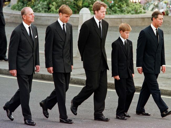 Prince Philip, Prince William, Earl Spencer, Prince Harry and Prince Charles walking behind the coffin of Princess Diana during her funeral procession in 1997. Picture: AFP