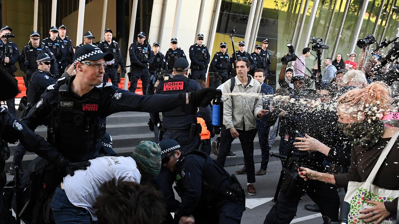 Victoria Police deploy OC spray on protesters on Tuesday. Picture: James Ross/AAP