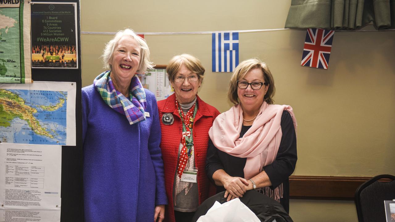 Cathie Irvin, Camberwell, Helen Johnstone, Castelmaine, and Valda Laird, Macedon, on the Associated Country Women of the World stand at the CWA Victoria annual general meeting in 2019 was held at the Williamstown Town Hall. Picture: Dannika Bonser