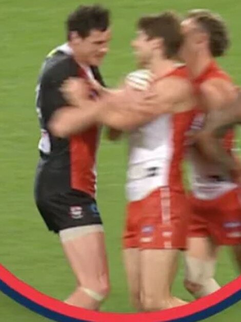 St Kilda's Jake Carlisle attacks Dane Rampe's injured hand. Picture: Fox Sports