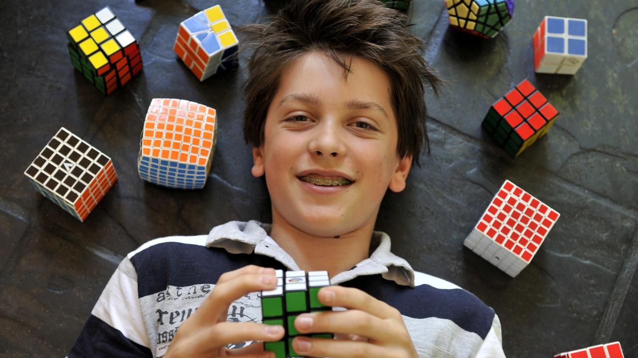 n26mp800 Feliks Zemdegs 13 from Armadale has just returned from the first Australasian Rubiks cube competition Held in Wellington New Zealand where he broke all current Australian records