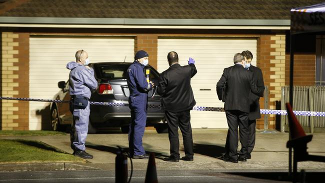 Police and forensics at the scene. Picture: Alan Barber