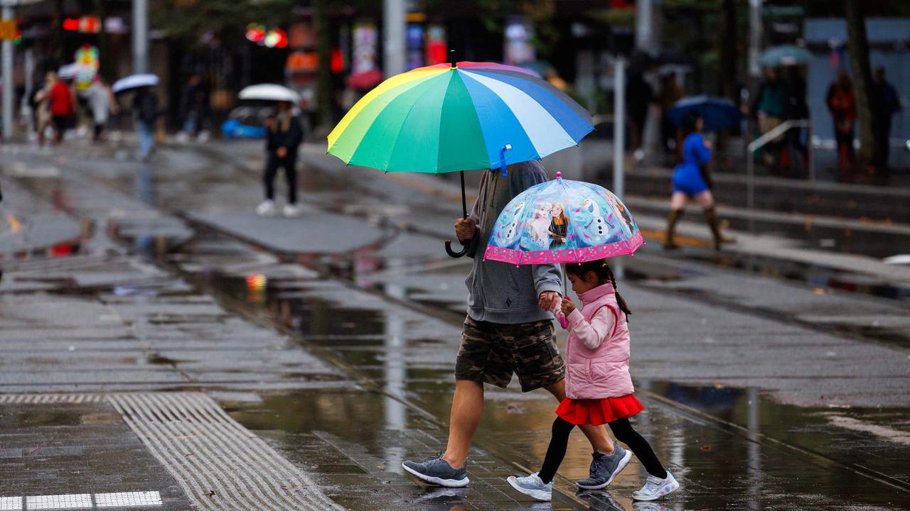 The wet weather hasn’t kept people from enjoying their weekend. Picture: NCA NewsWire / David Swift