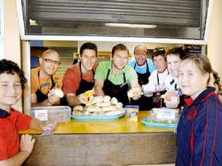 Men at work: Dads from Alstonville Public School worked the canteen yesterday. Picture: Cathy Adams