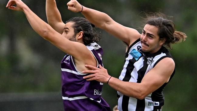 Ivanhoe’s Gerrard Williams spoils Kristian Ciciulla of Brunswick. Picture: Andy Brownbill