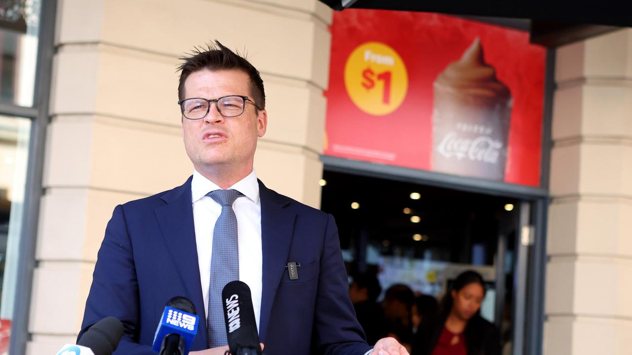 SDA Secretary Josh Peak speaking to media last year after safety screens were installed at McDonald’s on Hindley St. Picture: Kelly Barnes