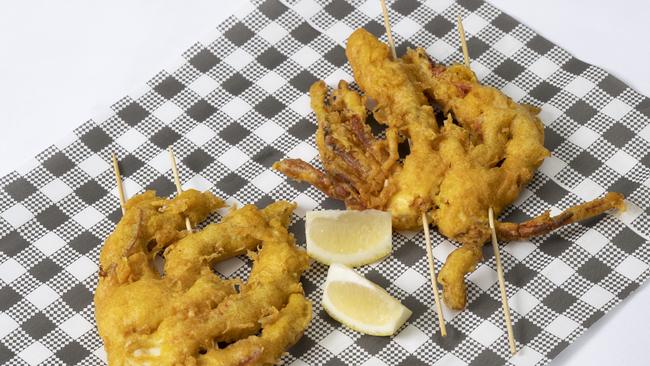 Soft-shell crab on a stick.