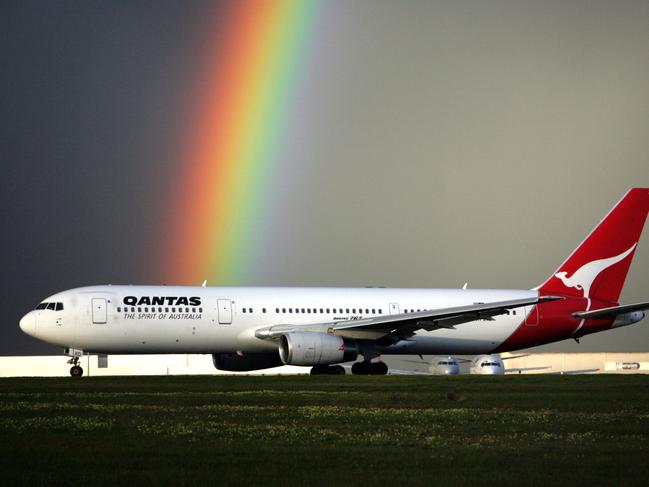 Qantas Boeing 767 aeroplane preparing for takeoff from Tullamarine Airport in Melbourne 24 Jul 2006. rainbow plane