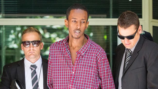 20-year-old Werribee man - Ali Khalif Shire Ali, born in Australia to Somali parents - was taken into custody by Special Operations Group police just before 3pm in Werribee on Monday. Picture: Mark Stewart