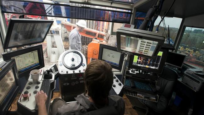 An operator works the controls of a rig fracking natural gas on a site in Washington Township, Pennsylvania. Picture: Ty Wright