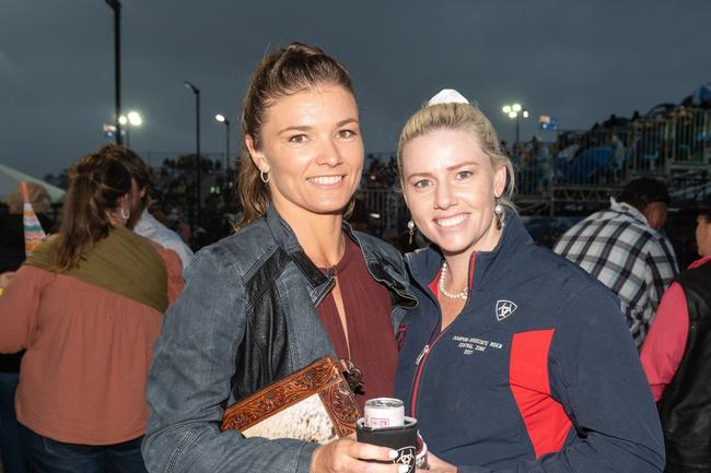 Bridgette Day and Ellise Burston at the PBR Bull Pit Bull Bash at Dittmann Bucking Bulls in Bloomsbury. August 27, 2022. Picture: Michaela Harlow