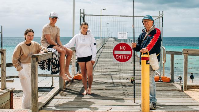 Harry LeBrun, Maisie Curtis, Sadie Curtis Tom Tierney at the Tumby Bay Jetty, which will be closed over summer due to storm damage. Picture: Robert Lang