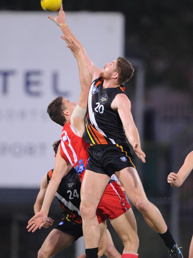 Jack Monigatti and Darcy Cameron vie for a hit out in a NEAFL game.