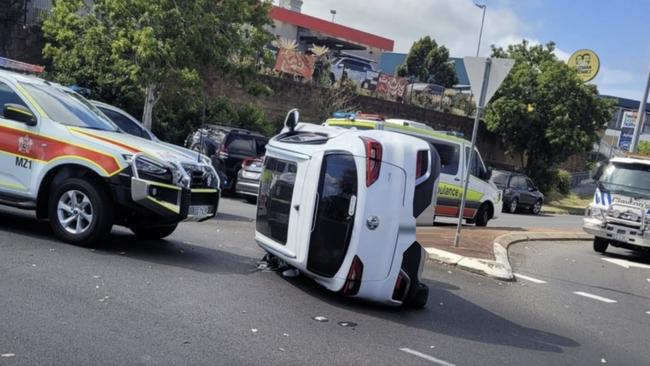 A car was left on its side after a crash at Boat Harbour Drive in Hervey Bay.