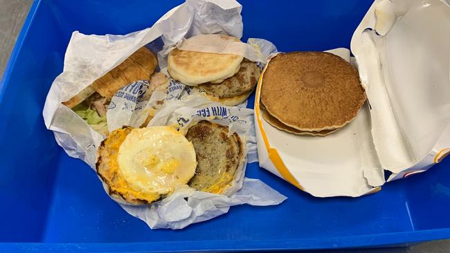 A traveller returning from Bali has been fined $2664 for carrying undeclared meat at Darwin Airport. The items including two sausage and egg McMuffins, were sniffed out by a detector dog. Picture: Supplied