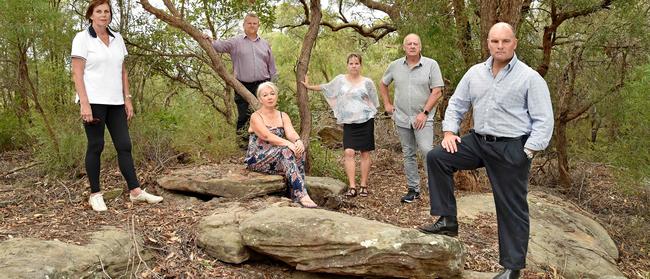 Kellyville Residents Action Group members are objecting to a Lyon Group development proposal for 71 homes to be built in the Cattai Creek Reserve. (AAP IMAGE / Troy Snook)