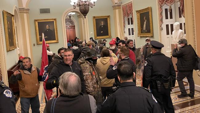 Protesters inside the Capitol which has been placed into lockdown. Picture: Igor Bobic/Twitter