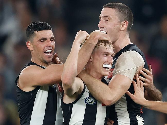 MELBOURNE, AUSTRALIA - MAY 12: Joe Richards of the Magpies celebrates his first league goal with teammates during the 2024 AFL Round 09 match between the Collingwood Magpies and the West Coast Eagles at Marvel Stadium on May 12, 2024 in Melbourne, Australia. (Photo by Michael Willson/AFL Photos via Getty Images)