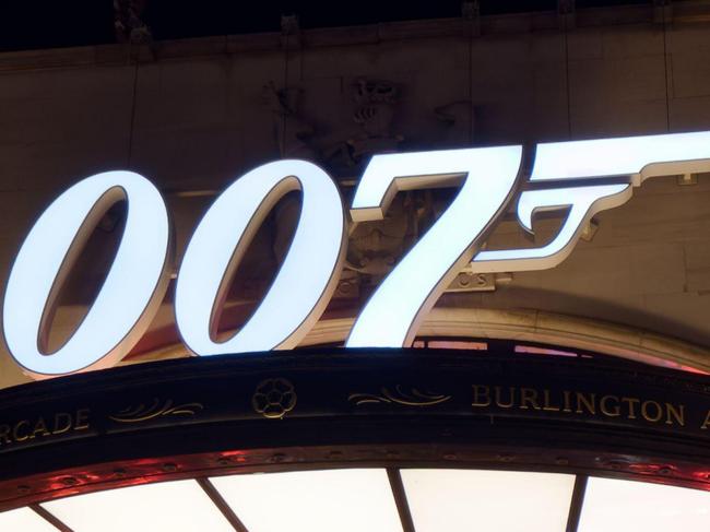 ONE TIME WEB USE FOR NEWS.COM.AU ONLY - FEES APPLY - MUST DOWNLOAD ON OWN ACCOUNT - 2HM68RX North entrance to Burlington Shopping arcade illuminated at night and with the famous 007 James Bond sign above.  Picture: Alamy