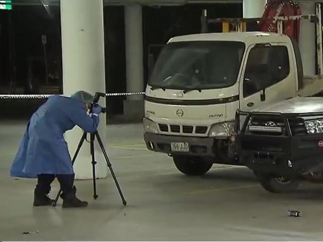 Police gathering evidence where the suspect ute was abandoned in the car park of a Bunnings store in Burleigh Waters. Picture: Nine Gold Coast News.