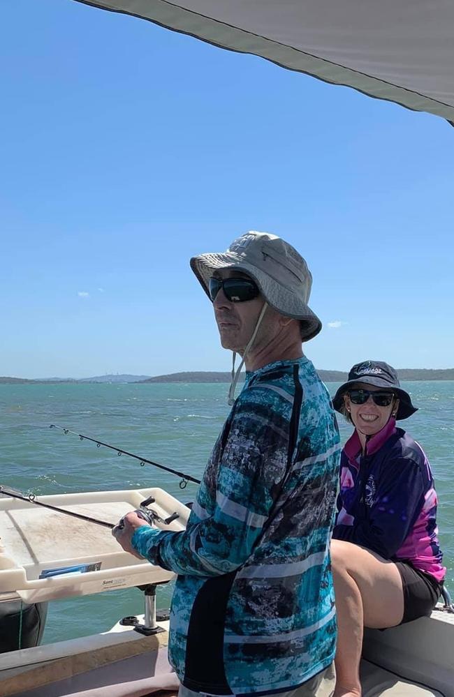 Mark and Sam Briggs enjoy a spot of fishing in Gladstone Harbour just before he was admitted to the Mater Private Hospital.