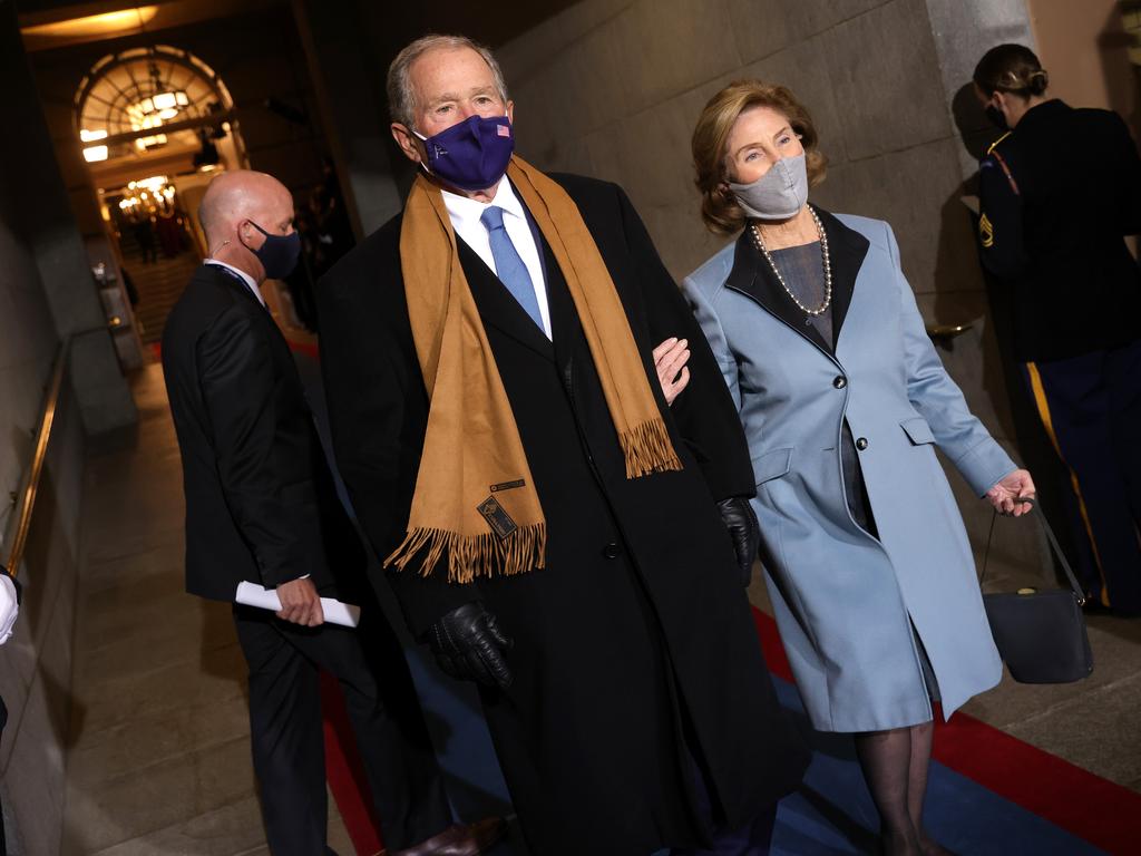 Former US president George W. Bush and wife Laura arrive. Picture: Win McNamee/Getty Images