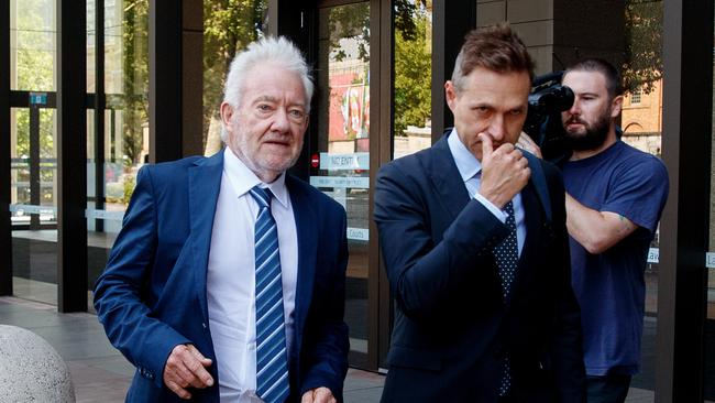 Peter Meakin and Angus Llewellyn leave the Federal Court.