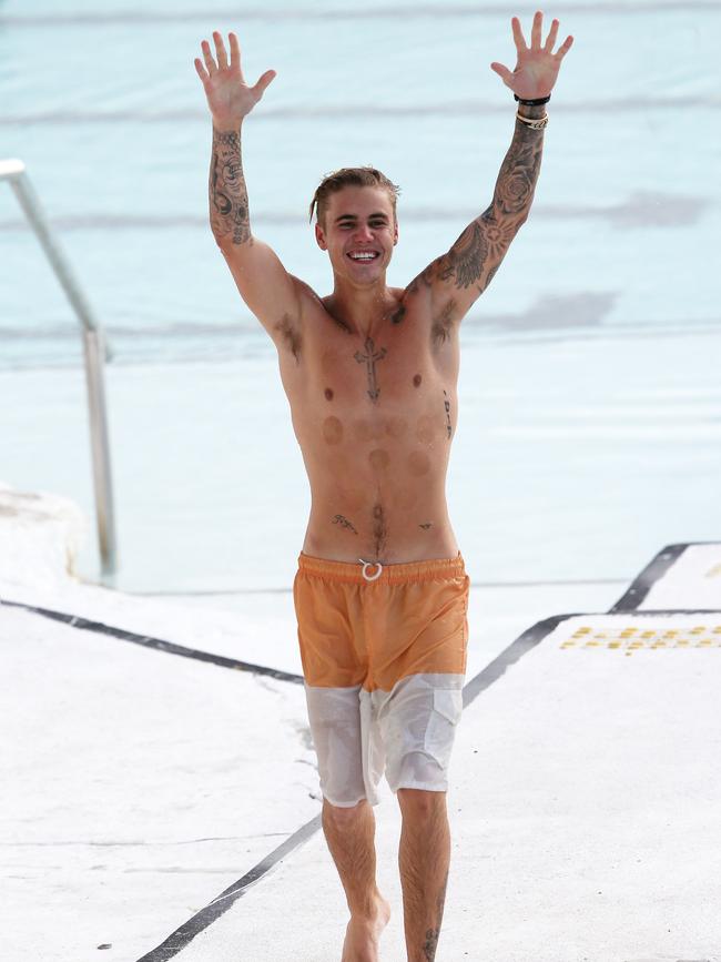 Justin Bieber spotted swimming at Bondi Iceberg in Sydney. Picture: KHAPGG/Matrix