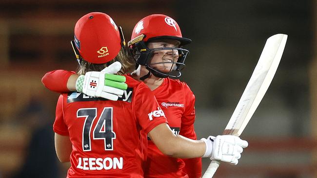 Renegades' Courtney Webb celebrates hitting the winning runs against the Sixers.