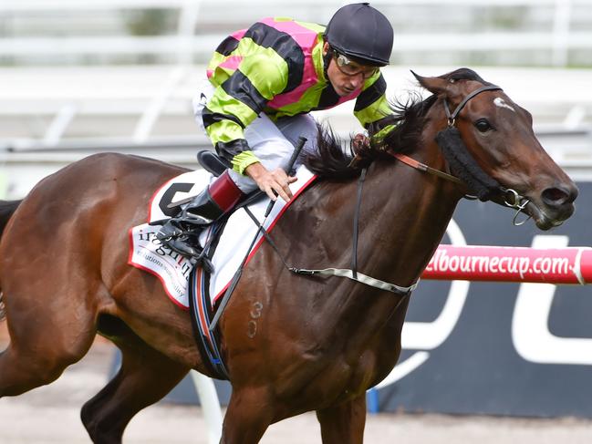 MELBOURNE, AUSTRALIA - MARCH 14: Damien Oliver riding Suavito wins Race 4, the Incognitus Blamey Stakes during Melbourne racing at Flemington Racecourse on March 14, 2015 in Melbourne, Australia. (Photo by Vince Caligiuri/Getty Images)