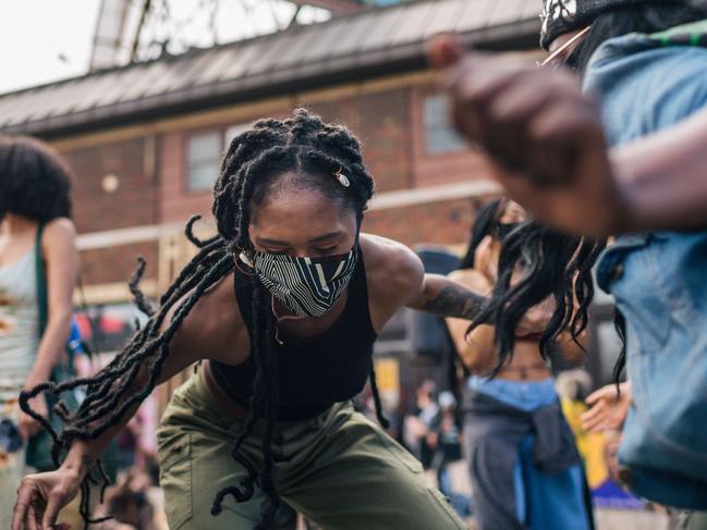 Women dance in Minneapolis, where protests and demonstrations continued amid the trial of former Minneapolis police officer Derek Chauvin. Picture: Getty Images/AFP