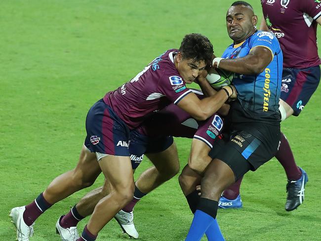 PERTH, AUSTRALIA - APRIL 23: Tevita Kuridrani of the Force is tackled by Fraser McReight of the Reds during the round 10 Super RugbyAU match between the Western Force and the Queensland Reds at HBF Park, on April 23, 2021, in Perth, Australia. (Photo by Will Russell/Getty Images)