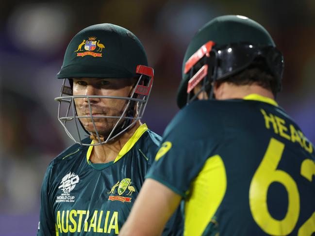 GROS ISLET, SAINT LUCIA - JUNE 15: David Warner of Australia looks on before walking onto the field for the second innings during the ICC Men's T20 Cricket World Cup West Indies & USA 2024 match between Australia and Scotland at Daren Sammy National Cricket Stadium on June 15, 2024 in Gros Islet, Saint Lucia. (Photo by Robert Cianflone/Getty Images)