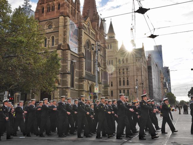 Marching down Swanston St towards the Shrine. Picture: Jason Edwards