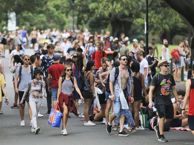 Crowds flock into Mrs Macquarie's Chair to claim positions for tonight's New Years Eve celebrations in Sydney. Picture: Dylan Robinson