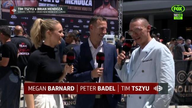 'Time to go for a swim' Tszyu swelters