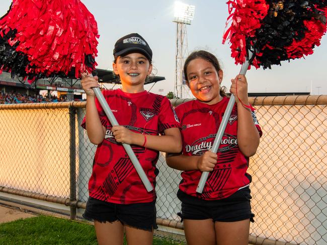 Scarlett Gilmore and Sophie Cole as thousands of fans gathered for the AFLW Dreamtime game between Richmond and Essendon in Darwin. Picture: Pema Tamang Pakhrin