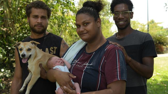 L/R: Dad Adam Fejo holds Whistler while his partner Jennifer Talbot holds one-week-old Zeron Fejo as godfather Lewis Malay looks on. They were all in the car when Zeron was born at Coolalinga lights. Picture: (A)manda Parkinson