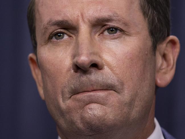 PERTH, AUSTRALIA - FEBRUARY 04: Western Australian Premier Mark McGowan speaks to the media during a press conference at Dumas House on February 4, 2021 in Perth, Australia. Mark McGowan announces a post-lockdown transition period for the Perth and Peel regions. It will remain in place until 12.01am Sunday morning, 14 February Ã¢â¬â allowing for the full 14-day incubation period to run its course. Parts of Western Australia entered a five-day lockdown on February 1, after a hotel quarantine worker tested positive to highly infectious Covid-19 strain. (Matt Jelonek/Getty Images)