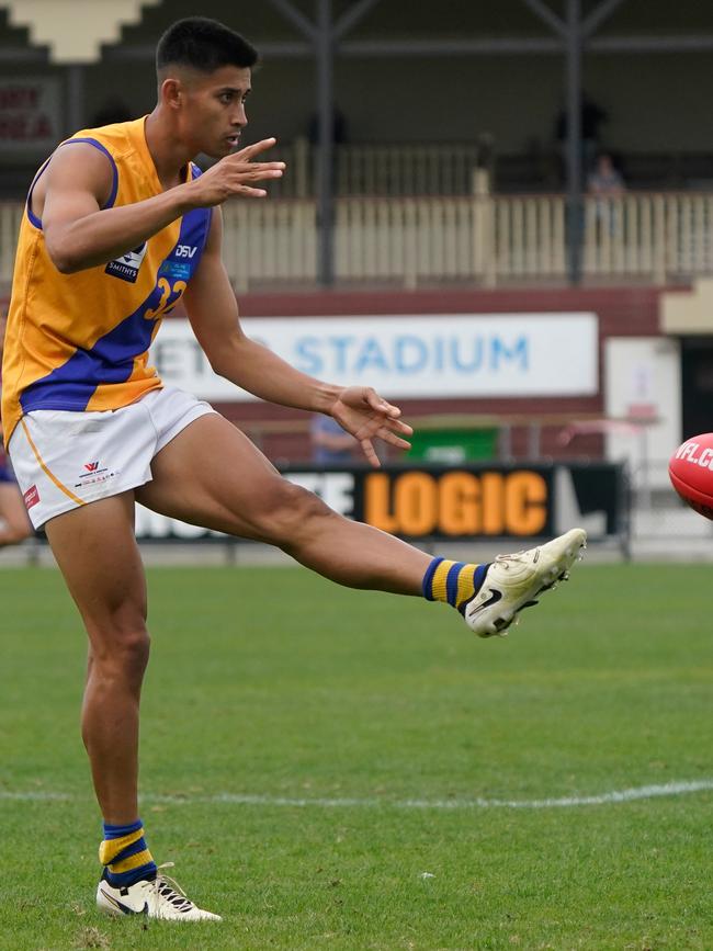 Jack McHale taking a kick for Williamstown.